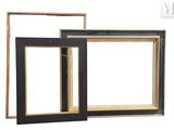 two black and gold picture frames with a white background