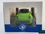 a box with a green car inside of it