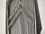 an image of a close up of a metal grill on a wall