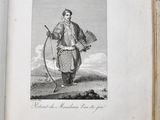an old book with a drawing of a man holding a bow and arrow