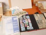 a table with a lot of stamps on it