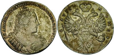 a silver coin with the image of a woman and a crown on it