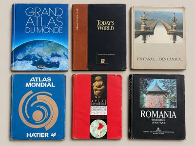 several books are lined up on a table in a row