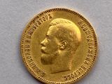 l'image d'une pièce d'or sur laquelle figure le visage d'un homme