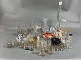 a lot of glass items that are on a table