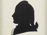 silhouette of a man in profile with a cigarette in his hand