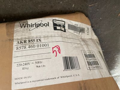 a cardboard box sitting on the floor with a price tag on it