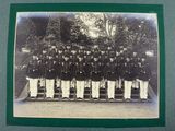 a black and white photo of a group of men in uniform