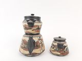 two vases that have been painted with animals on them