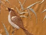 a bird that is sitting on a branch of a tree