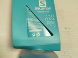a blue container with a toothbrush on top of it