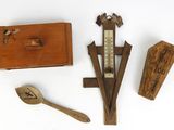 a wooden box with a thermometer and a wooden spoon and spoon rest