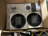 a box that has two electronic devices inside of it