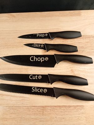 four different types of knives on a cutting board with the words chop, cut, slice, dice