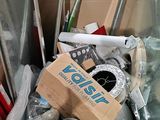 a cardboard box full of assorted items in a room