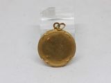 an image of a small gold locke with a chain around it