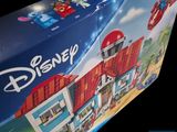 a box that has a lego disney house in it