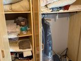 an image of a closet with a lot of stuff in it