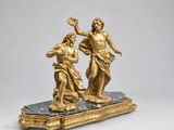une image représentant une statue d'un homme et d'une femme posée sur un socle en marbre