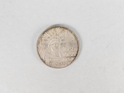 an image of a small coin on a white surface