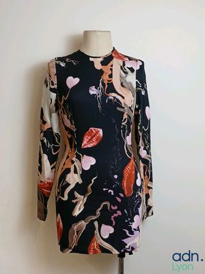 a close up of a dress on a mannequin on a mannequin stand