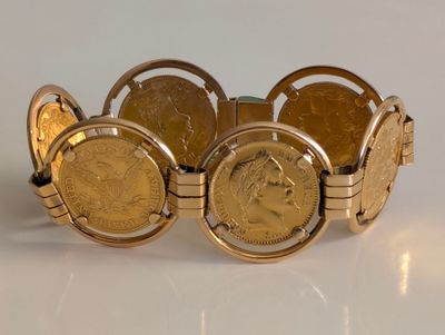 bracelet made of gold coins with a lady ' s face on the side