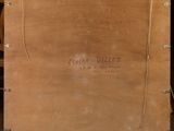 a wooden box with a sign on it in a room