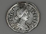une pièce d'argent portant l'image d'un homme