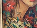 painting of a woman with red hair and flowers in a gold frame