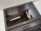 a laptop that is sitting on a table with a keyboard