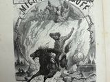 an old book with a picture of a man on a horse