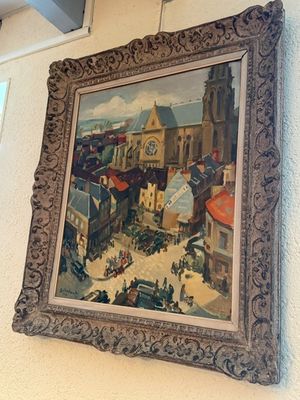 a picture of a painting hanging on the wall