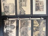 a picture of a collection of old photos hanging on a wall