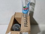 a box with a glass and a bottle of water inside of it