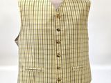 a close up of a mannequin wearing a yellow and black checkered vest