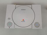 the sony playstation game system is sitting on the table