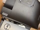 a box with a laptop and a mouse in it