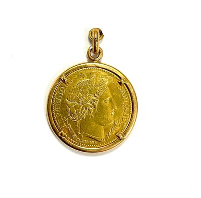 an image of a gold coin with a woman ' s face on it