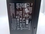 a close up of the back of a black computer
