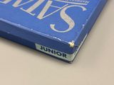 a blue book sitting on top of a table
