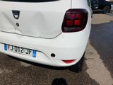 a white car that is parked in a parking lot