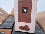 a box of chocolates sitting on top of a table
