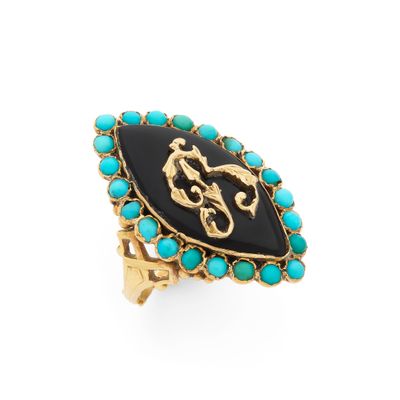 BAGUE de forme navette retenant l'initiale B sur onyx dans u…