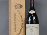 an image of a bottle of red wine next to a wooden box