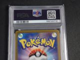 the pokemon card is in a clear plastic holder on a table