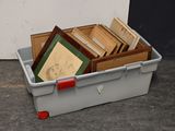 a box full of books sitting on the floor