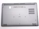 a laptop that is sitting on a white surface