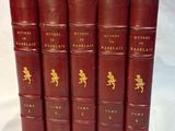 six red books with gold writing on them sitting on a white surface