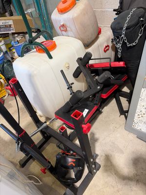 a picture of a garage with a lot of items on the floor