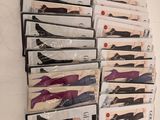 several pairs of women ' s stockings are stacked on top of each other
